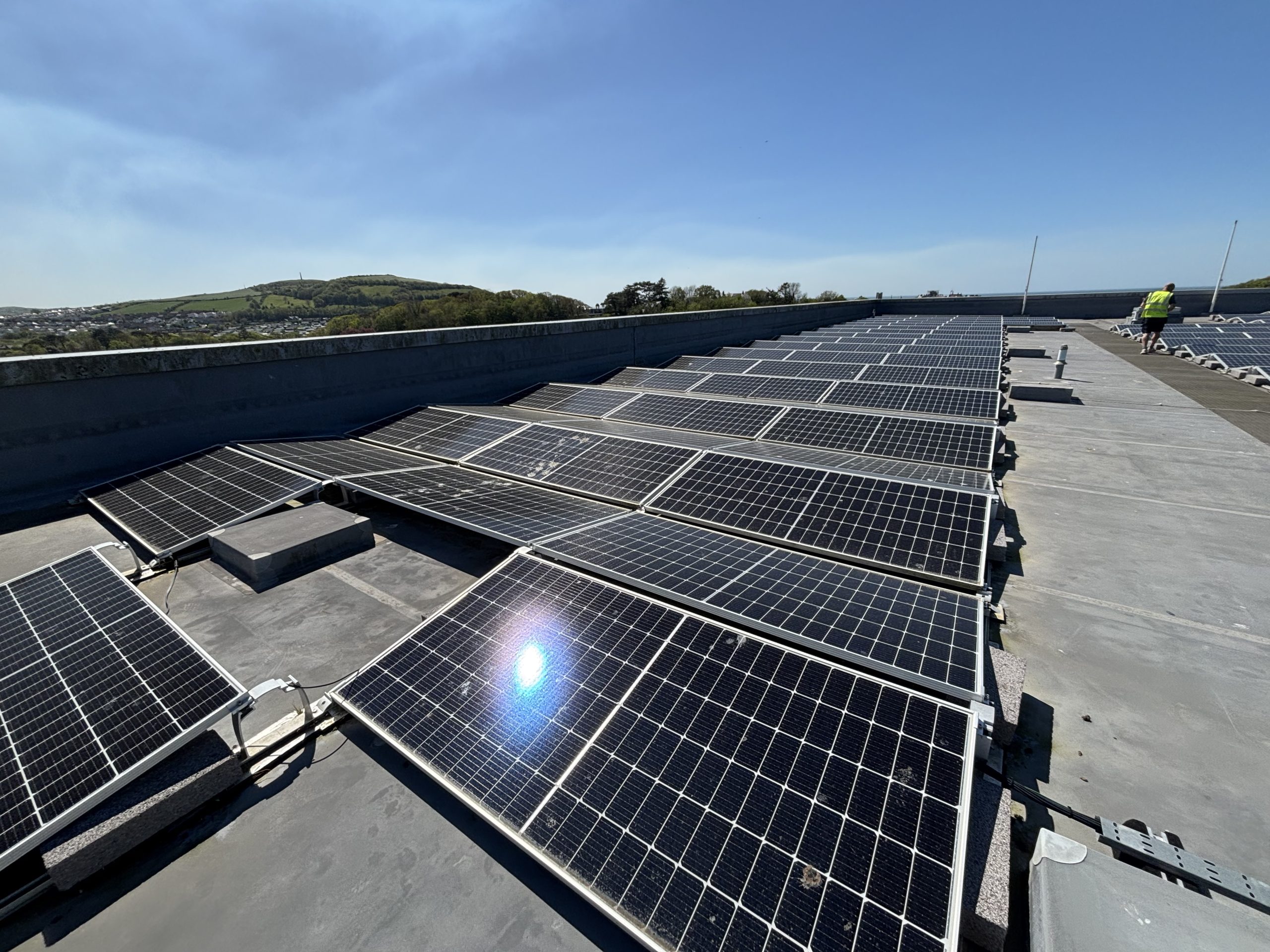Large commercial rooftop solar array installed by Bright Spark